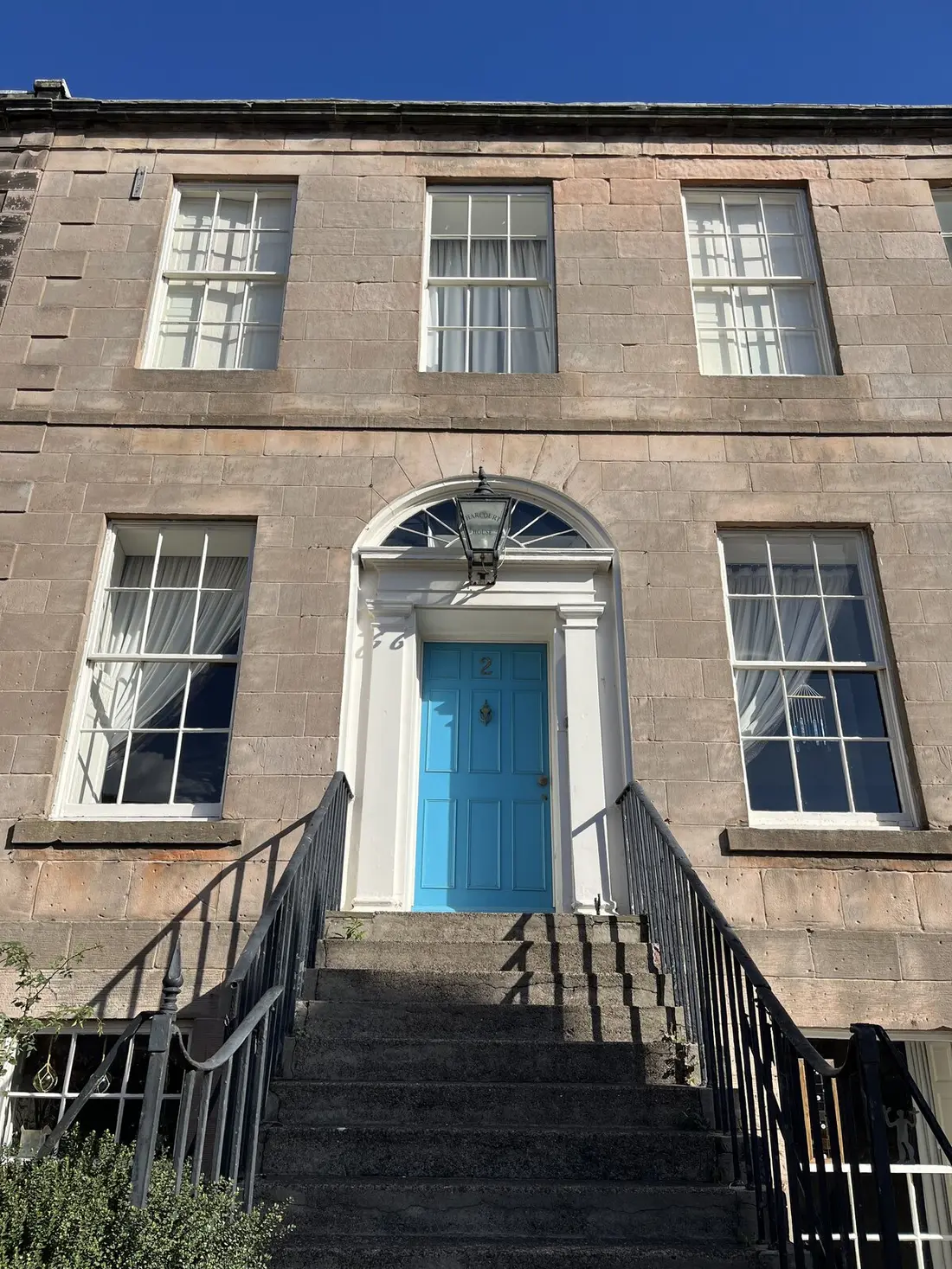 A Georgian front door painted blue at Ravensdowne, Berwick-upon-Tweed
