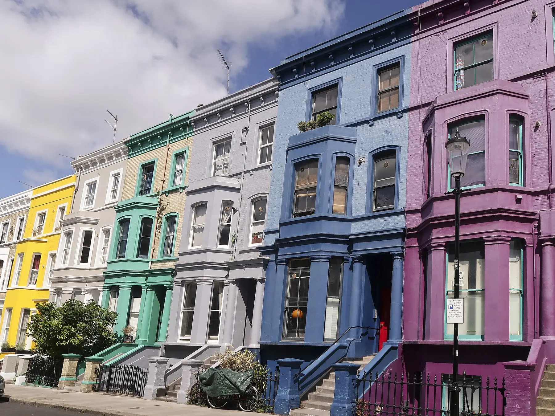 Brightly painted terraced townhouses in Notting Hill, London