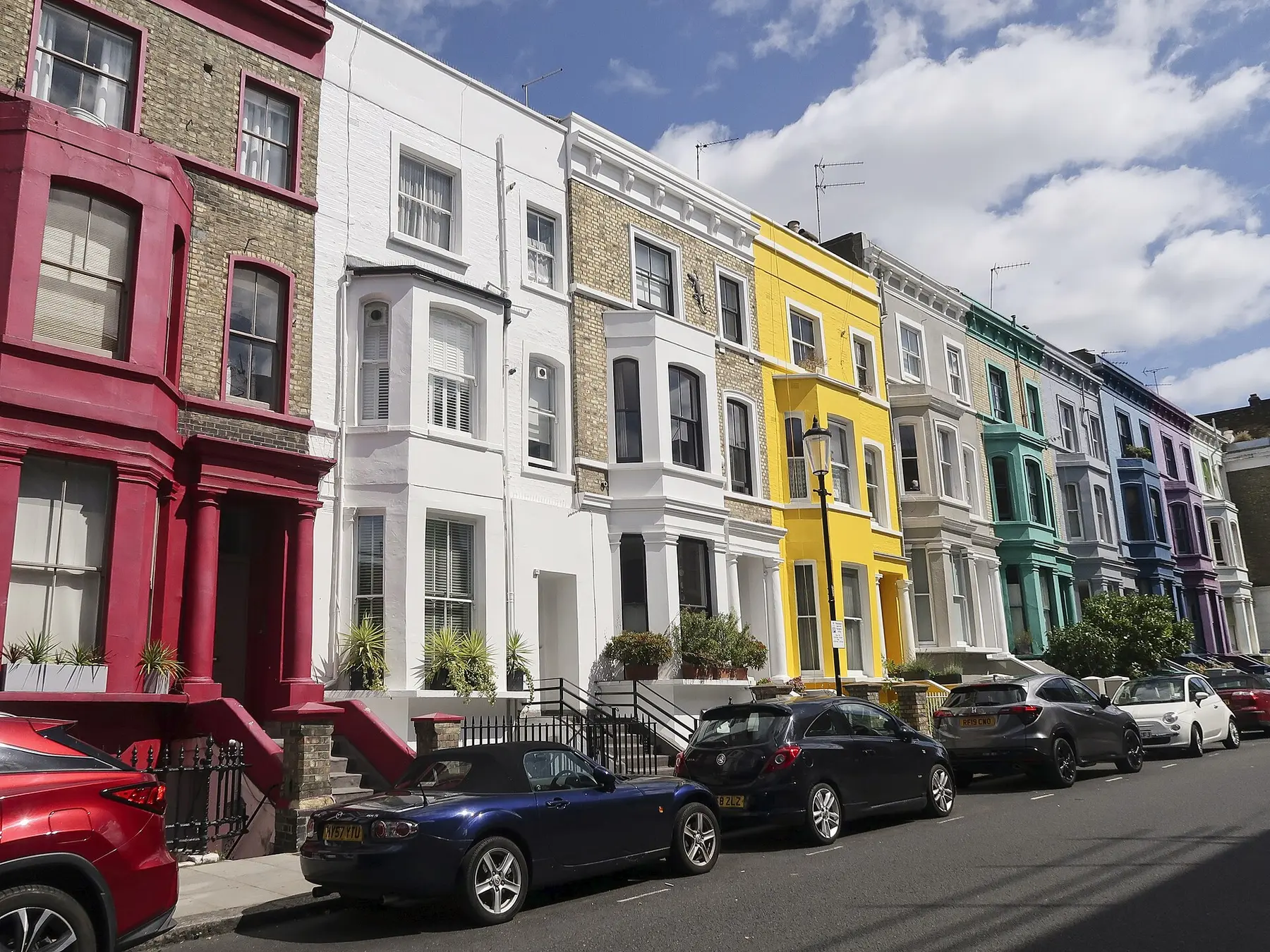 Colourful painted houses on Lancaster Road, Notting Hill, London